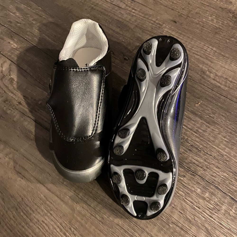 Toddler cleats.New size 11
